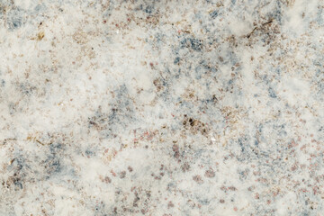 texture of gray stone tile with undertones of blue, red