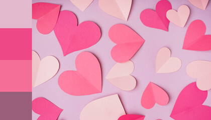 Obraz premium Pink paper hearts on lilac background. Valentine's Day celebration