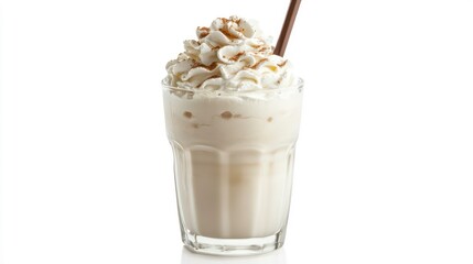 Vanilla milkshake in a glass with whipped cream and straw on white background.