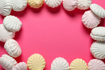 Frame made of sweet zephyr on pink background