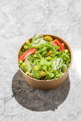 vegetable vegetarian salad in a craft container
