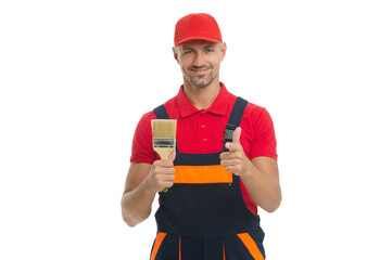 Home renovator. Man painter hold paintbrush. Paint brush for decorator. Pointing finger. Renovation work. Decorator man do renovation painting. Man renovator isolated on white. Painter renovating