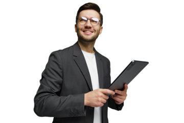 Young professional smiles confidently while using a tablet in a business setting, showcasing technology and engagement