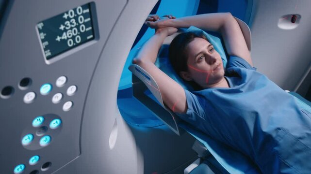A patient undergoing a CT scan in a modern clinic. The concept of using innovative technologies for effective diagnostics and patient care.