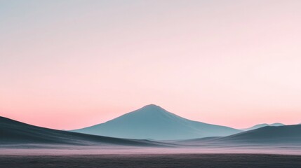 Serene sunrise over a volcanic landscape.