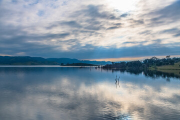Morning cloud reflections at Windamere Dam in Cudgegong, close to Mudgee in the Central West of NSW, Australia.