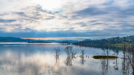 Morning cloud reflections at Windamere Dam in Cudgegong, close to Mudgee in the Central West of NSW, Australia.