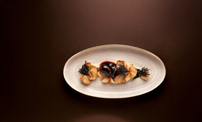 Crispy Mushroom and Black Garlic Appetizer. Generated image