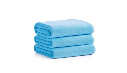 Three neatly stacked soft blue towels on a clean white background, ideal for home decor or spa settings