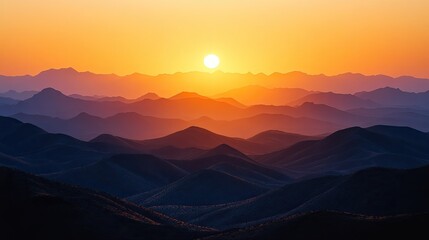 Fototapeta premium Breathtaking sunset over layered mountain ranges with vibrant colors and serene atmosphere