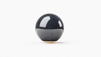 A sleek black ceramic sphere sits elegantly on a light background, showcasing modern design aesthetics