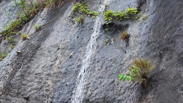 Drone View of a Beautiful Waterfall in Harau Valley, Indonesia