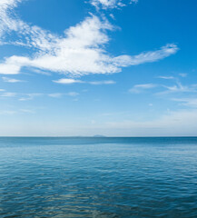 Obraz premium Landscape beautiful summer vertical horizon look view point shore open sea beach cloud clean and blue sky background calm nature ocean wave water nobody travel at thailand chonburi sun day time