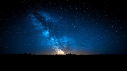 Obraz premium Night Sky Starry Galaxy Above Silhouetted Field