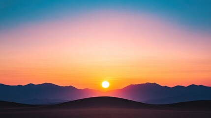 Serene sunset over rolling sand dunes with distant mountains, evoking tranquility and nature's beauty