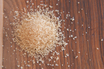 A Pile of Brown Sugar Sitting on a Wooden Surface in the Kitchen
