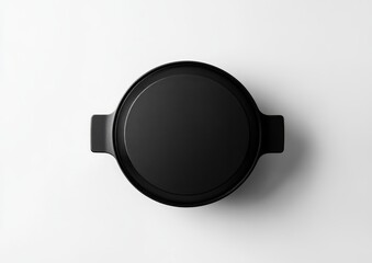 Top view of a black cooking pot with lid and handles on white background.