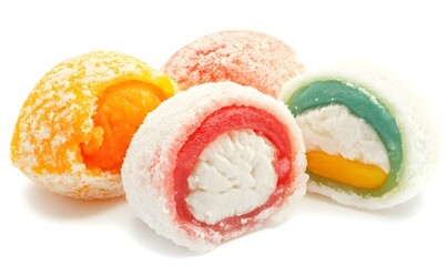 Colorful sugared fruit candies on white background