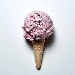 Delicious pink ice cream scoop in a cone on a white background, perfect for dessert menus or food blogs