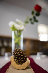 Natural pine cone wedding centrepiece for reception