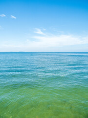 Fototapeta premium Photography landscape beautiful summer vertical horizon look view shore open sea beach cloud clean and blue sky background calm nature ocean wave water nobody travel at thailand chonburi sun day time