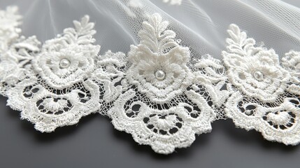 Obraz premium Elegant white lace fabric detail, close-up shot