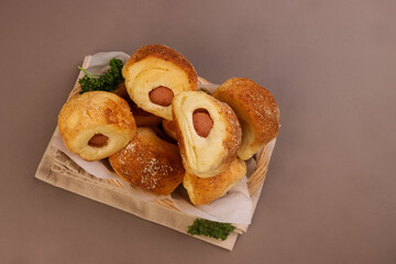 Mini Sausages Roll Buns with Parmesan Cheese. 