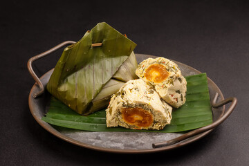 Pepes or Bothok Tahu Telur Asin is Indonesian Traditional Food From Tofu with Salt Egg.