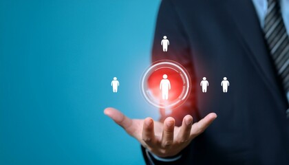 Businessman holding a digital human resources icon in his hand, representing talent acquisition and management.