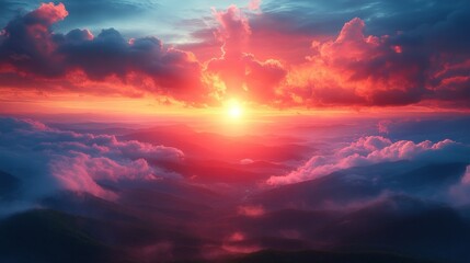 Fototapeta premium Vibrant sunset over mountainous landscape with colorful clouds and fog.