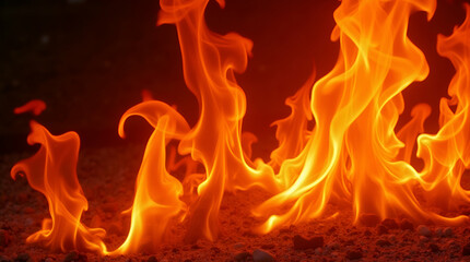 Intense Orange Flames Dancing on Dark Substrate