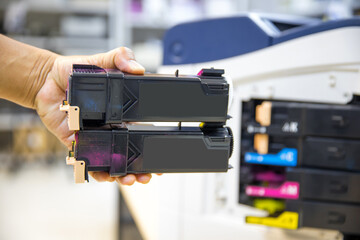 Technician Holding ink printer toner low for replace new or fix repair problem paper or print...