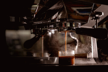 espresso machine pouring coffee