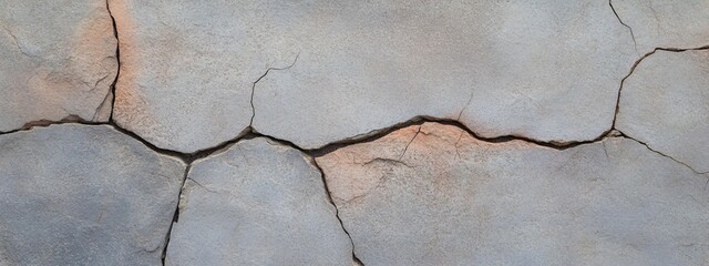 Obraz premium Close-up of a textured basalt surface with fine cracks, exuding natural rugged beauty for a modern wallpaper design.