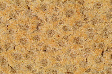 Crispy low calorie high fibre rye crispbread background texture