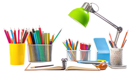 A colorful collection of art supplies including pencils, markers, and notebooks arranged on a desk with a stylish lamp for creative inspiration.