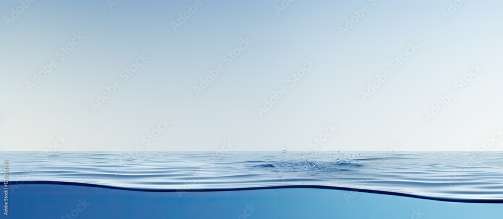 Fototapete Tranquil blue water surface with gentle waves under a soft gradient sky creating a serene minimalistic composition ideal for copy space.