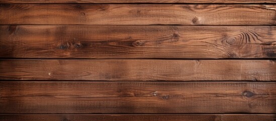 Naklejka premium Rustic wooden background with deep brown tones and natural grain patterns creating a warm textured space ideal for placing images or texts.