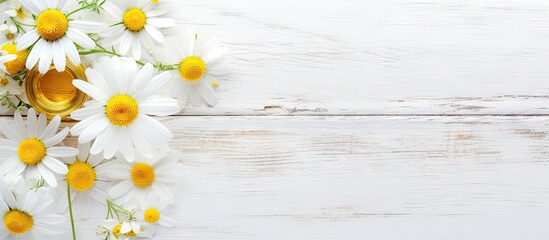 Fototapeta premium Beauty product samples elegantly arranged with chamomile flowers on a white wooden table, showcasing a fresh and natural aesthetic.