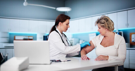 Doctor Making Vaccine Injection