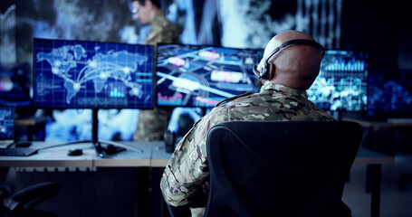 Army Soldier Operates Advanced Computer Technology