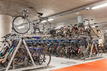 Bicycle parking. Garage for bicycles. Two-level parking for bicycles.