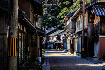 Obraz premium Narrow Street Between Traditional Japanese Wooden Houses, Ine, Kyoto, Japan