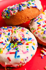 Close up of Vanilla Cake Donuts On Red
