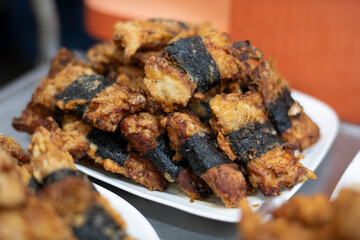 Platter of nori chicken on display in okazuya Japanese deli