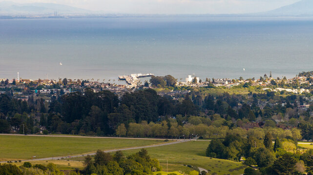 Aerial view of Santa Cruz pier and Monterey Bay from drone over campus
