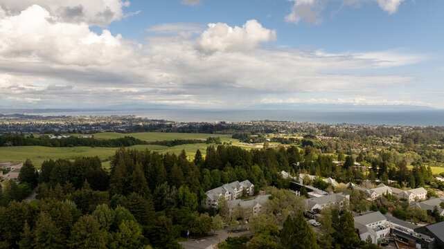 Aerial view of Santa Cruz and Monterey Bay from drone over campus