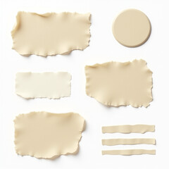 Obraz premium A collection of abstract, torn, and cut shapes in a soft beige color palette, showcasing various forms and textures, ideal for backgrounds or creative designs.