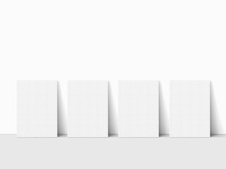 Four blank canvas on the floor