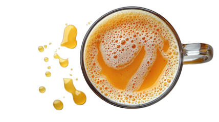 Frothy juice splashing from glass mug, top view, dark background